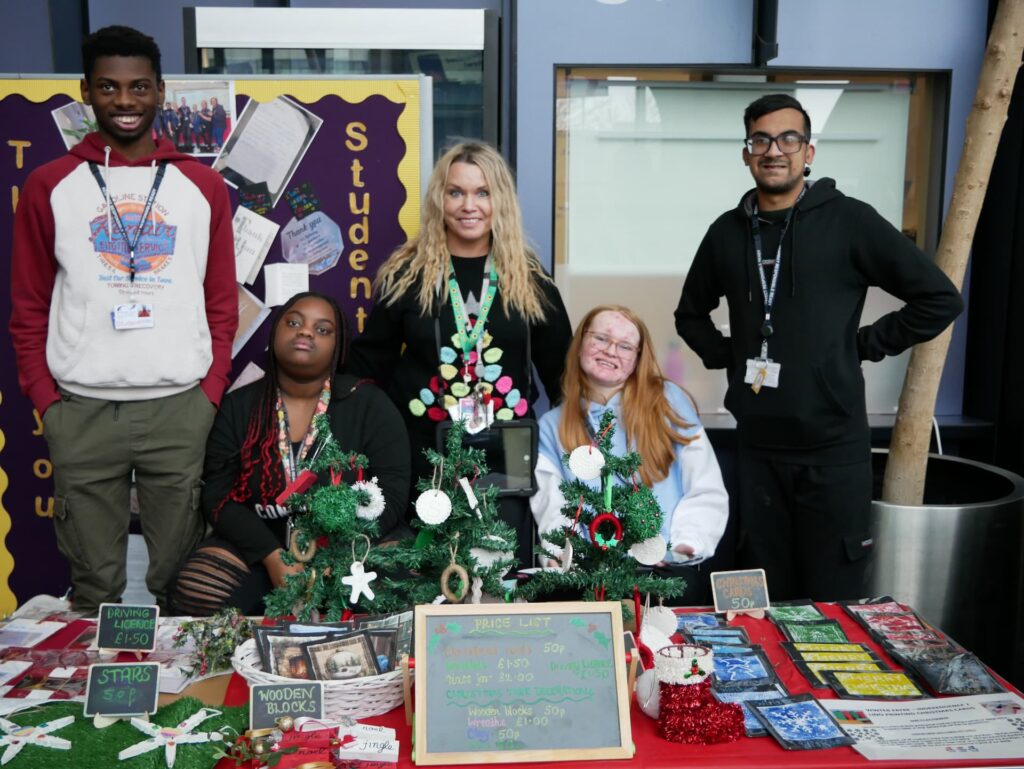 Foundation Learning staff and students selling Christmas items