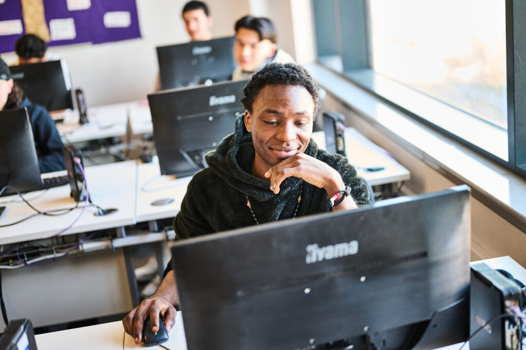 Student working on his screen