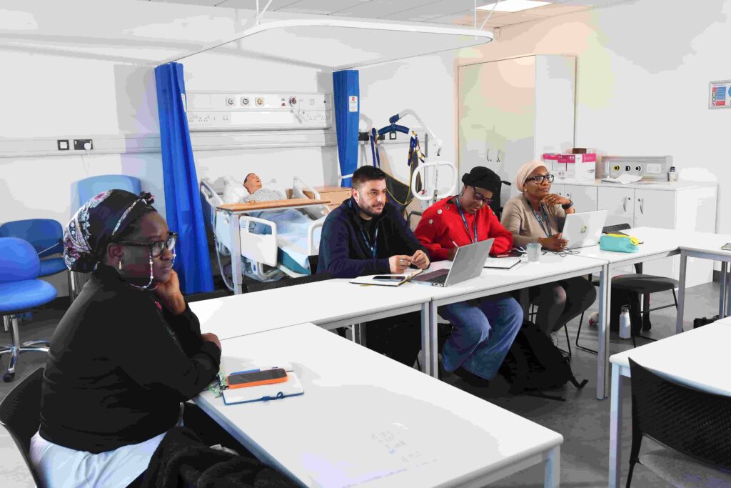 Adult students in healthcare classroom