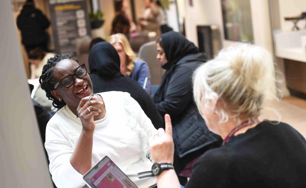 Student talking to teacher at Cradley Heath