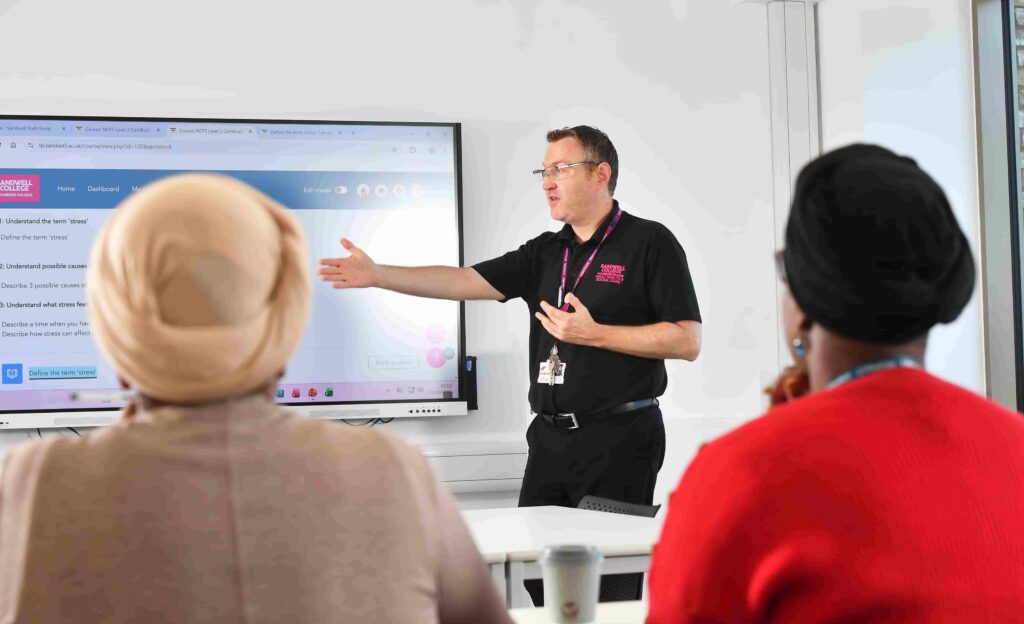 Teacher supporting in classroom